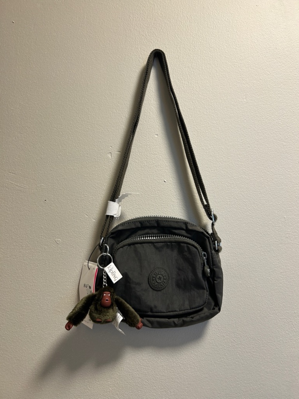 Kipling Charcoal Gray Crossbody Bag with Monkey Charm